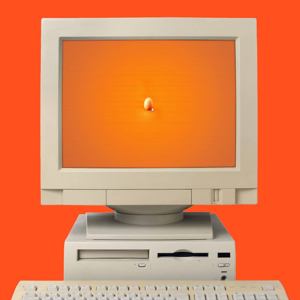 Ein Computer mit einem Osterei als Hintergrund